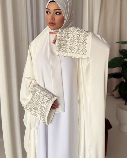 white abaya with stone embellished sleeves
