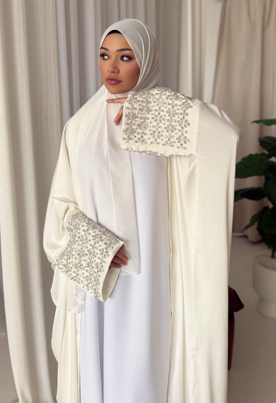 white abaya with stone embellished sleeves