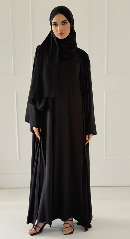 black sleeveless slip dress