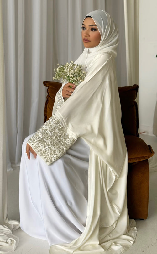 white abaya with stone embellished sleeves