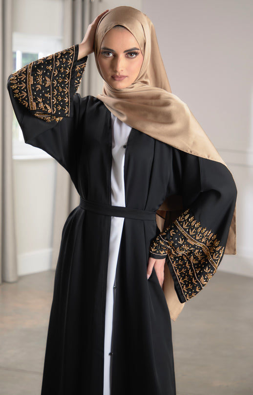black abaya with gold embellished sleeves