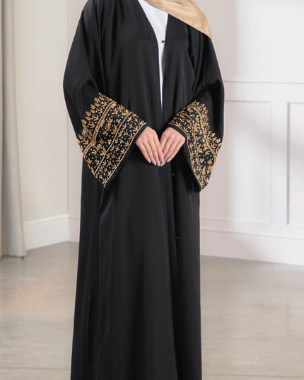 black abaya with gold embellished sleeves