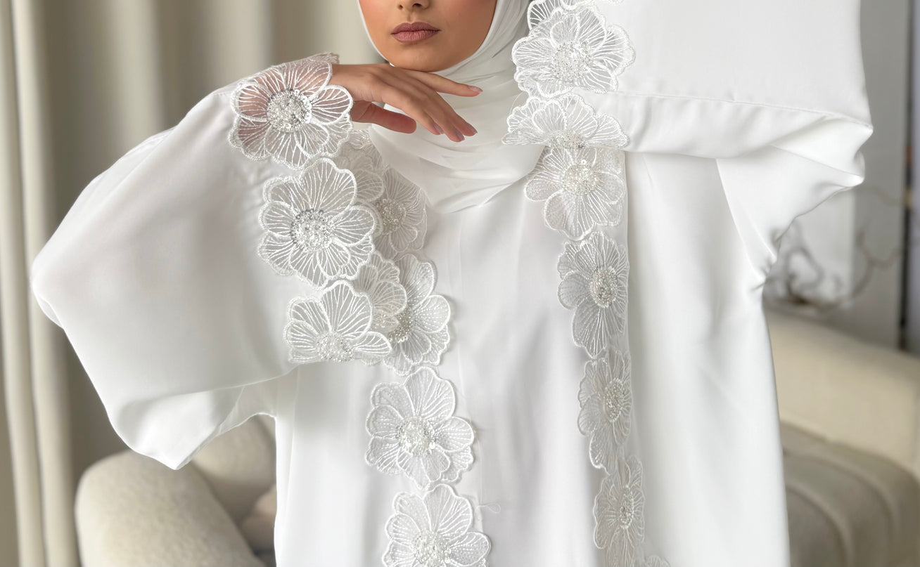 white abaya with floral lace border