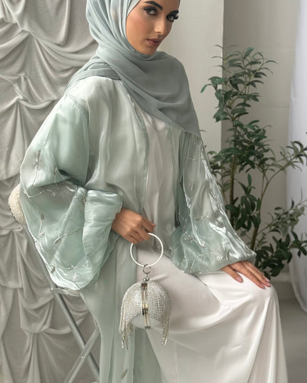mint abaya with silver embellishments