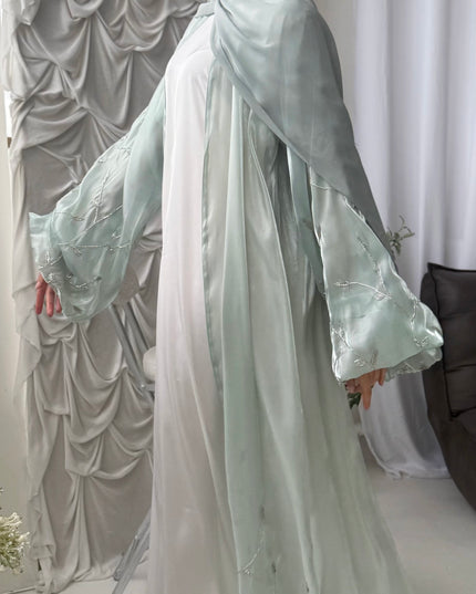 mint abaya with silver embellishments