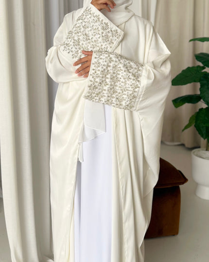 white abaya with stone embellished sleeves