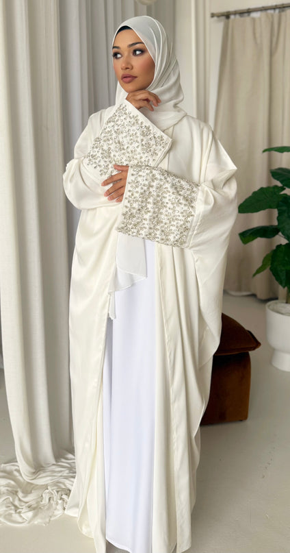 white abaya with stone embellished sleeves