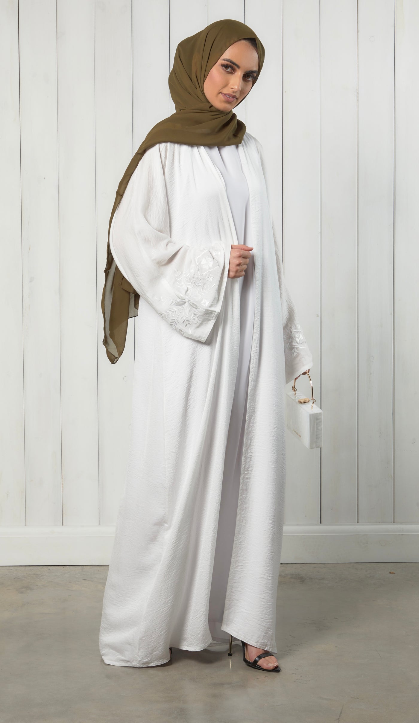 white abaya with embroidered sleeves