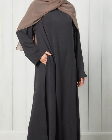 black closed abaya with pockets