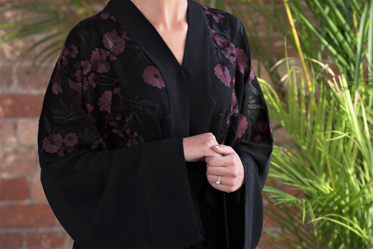 Aaliya Collections A classic black abaya with contrasting burgundy floral embroidery
