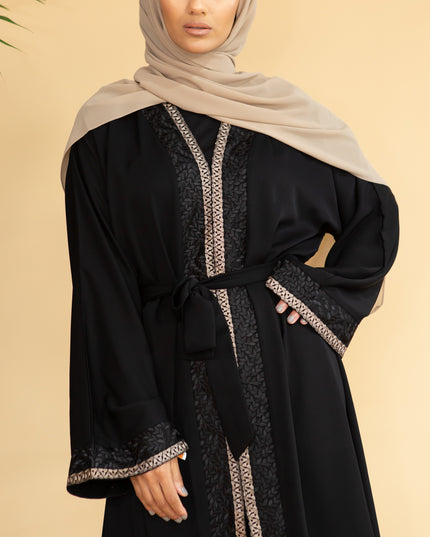 Aaliya Collections Hidaya Abaya A beautiful black abaya with a gorgeous contrast of gold and black leaf bordering